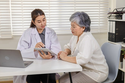 Doctor and patient discussing medical results in a clinic setting