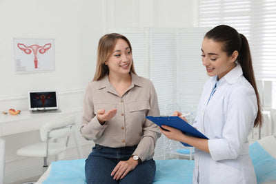 Doctor and patient discussing in a medical office setting regarding reproductive health