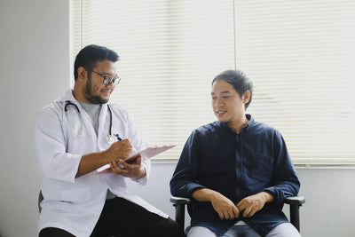 Doctor and patient sitting in a consultation room