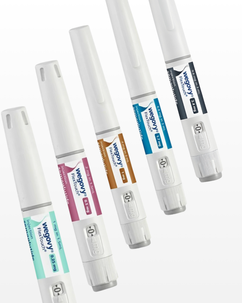 Five wegovy pens in different color-coded variants (mint green, pink, orange, blue, and black) arranged diagonally on a clean white background.